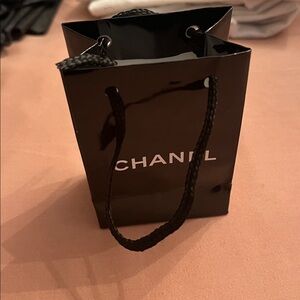 Chanel mini gift bag and nylon dust bag